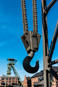 Low angle view of built structure against blue sky