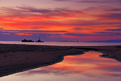 Offshore torii and sunrise