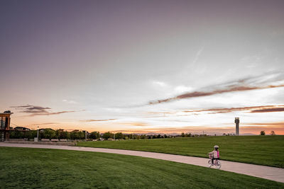 Scenic view of field against sky during sunset