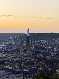 High angle view of city at sunset