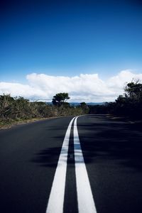 Empty road against sky