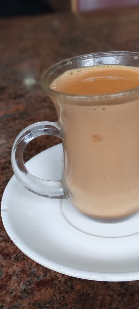 drink, refreshment, food and drink, cup, coffee, mug, coffee - drink, coffee cup, saucer, crockery, table, close-up, still life, indoors, freshness, frothy drink, hot drink, kitchen utensil, no people, food, latte, non-alcoholic beverage, glass