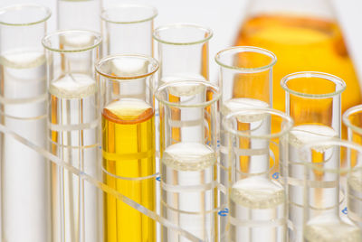 Close-up of chemicals in test tubes on table