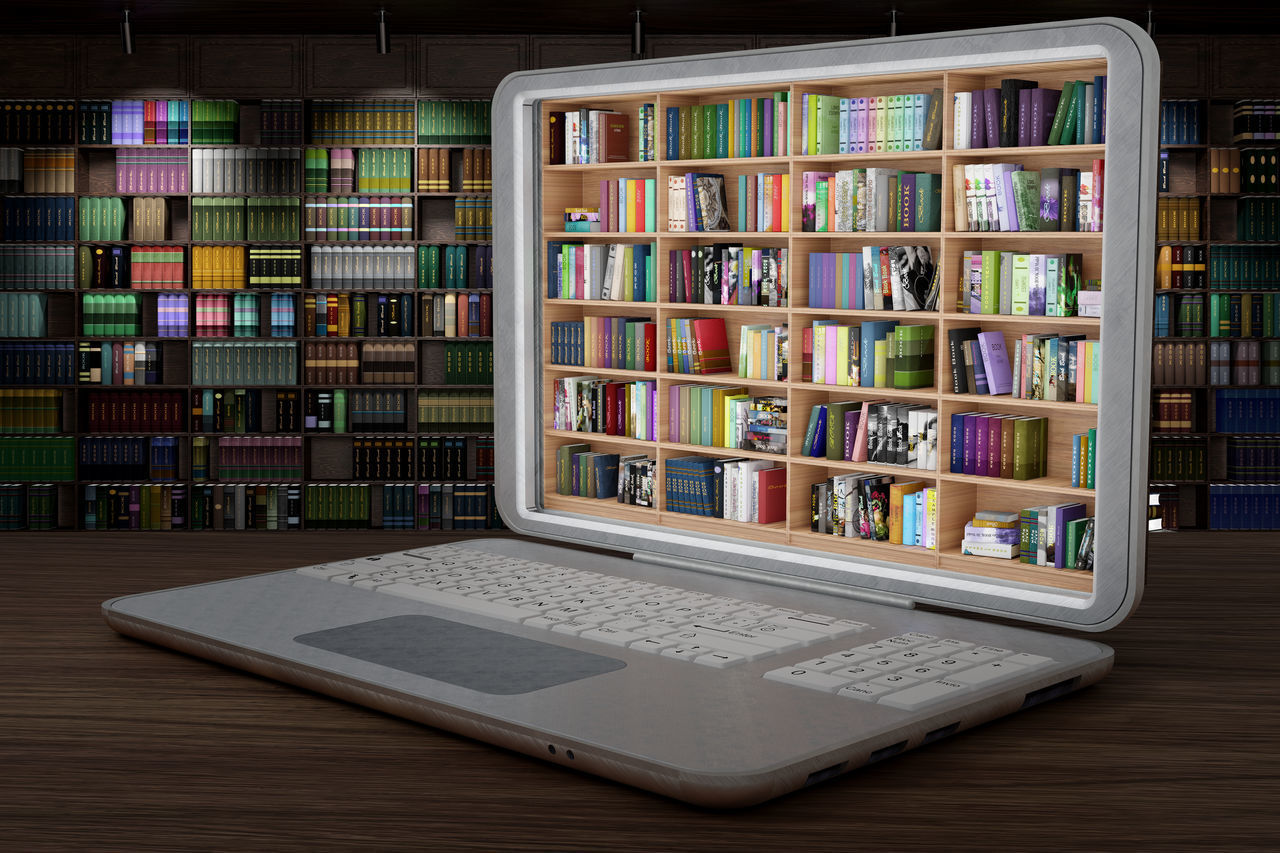 OPEN BOOK ON TABLE IN SHELF