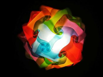 High angle view of multi colored art against black background
