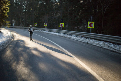 View of person on road in winter