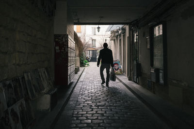 Full length of woman walking in building