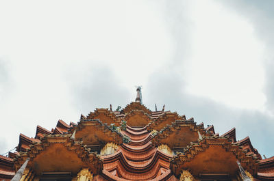 Low angle view of temple building against sky