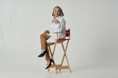 Woman sitting on chair