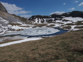 Scenic view of mountains against sky during winter