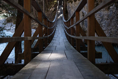 View of footbridge in forest