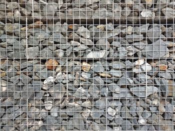 Full frame shot of metal fence in cage