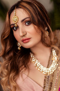 Portrait of a young woman in the national costume of india