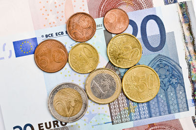 High angle view of coins