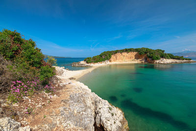 Scenic view of sea against blue sky