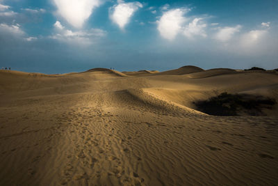 Scenic view of desert against sky