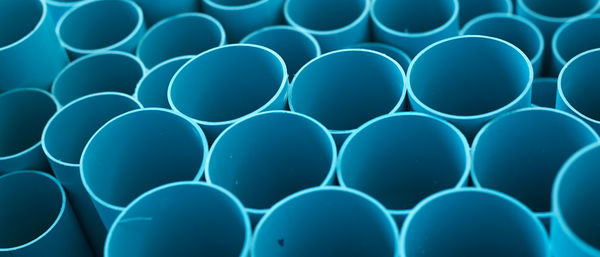 Full frame shot of blue pipes in factory