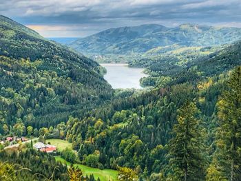 High angle view of trees and mountains against sky