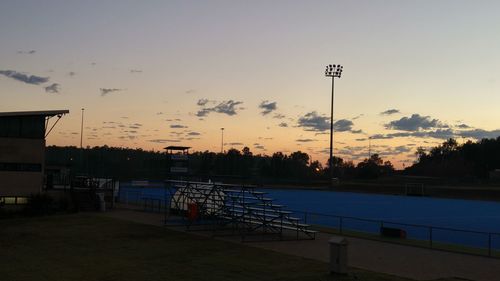 View of street light against sky at sunset