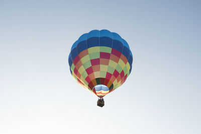 Low angle view of hot air balloon against clear sky