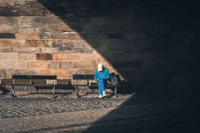 Full length of woman on wall