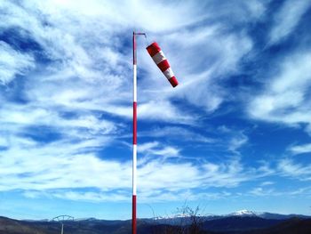 Low angle view of flag against sky