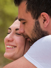 Close-up portrait of smiling young man