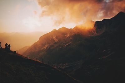Scenic view of mountains against sky during sunset
