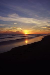 Scenic view of sea at sunset