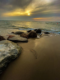 Scenic view of sea against sky during sunset