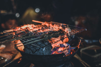 Close-up of bonfire on barbecue grill