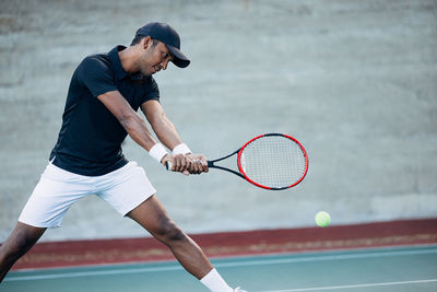 Man playing tennis