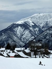 Scenic view of snow covered mountains