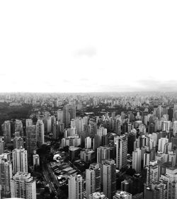High angle view of buildings in city against sky