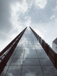 Low angle view of skyscraper against sky