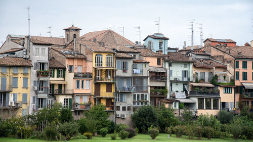 View of residential buildings against sky