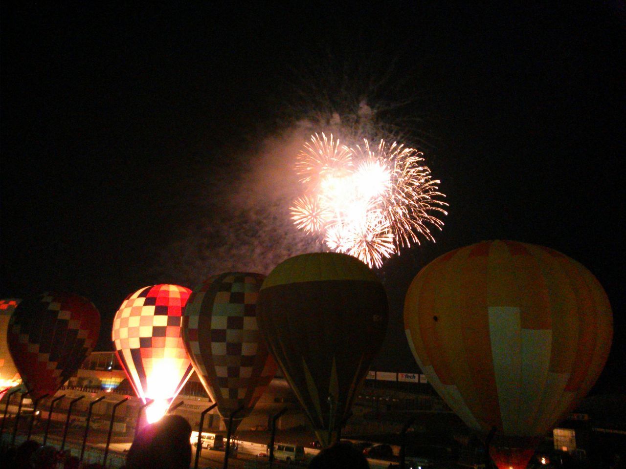 illuminated, night, lighting equipment, glowing, low angle view, lantern, celebration, light - natural phenomenon, decoration, flame, lit, burning, fire - natural phenomenon, dark, arts culture and entertainment, orange color, no people, electric light, outdoors, built structure