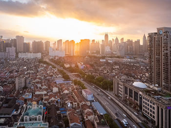 High angle view of cityscape and sunset