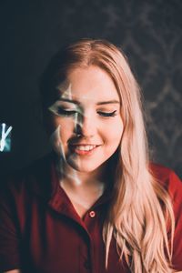 Close-up of smiling young woman