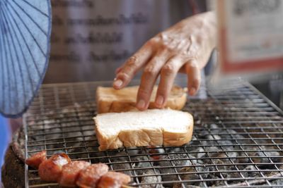 Close-up of person preparing food