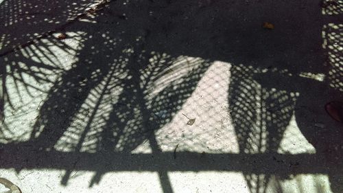 High angle view of shadow on wall