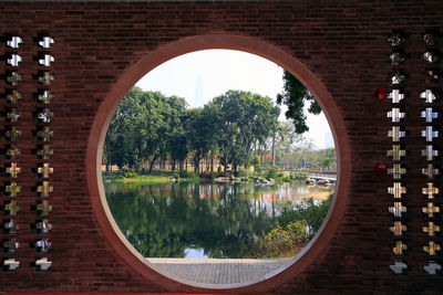 Trees seen through arch window