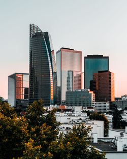 Modern cityscape against clear sky