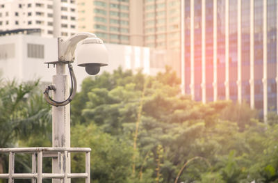 Dome cctv cameras on high pillars to capture traffic on the road.