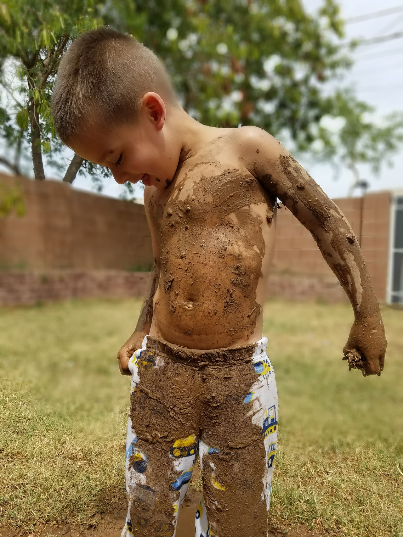 Kid in mud