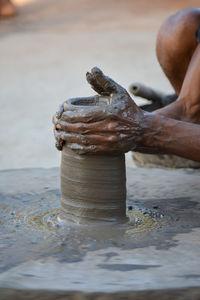 Man working in mud