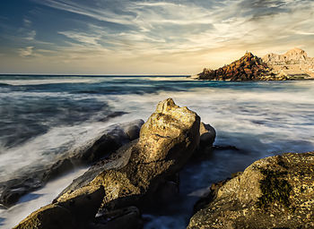 Scenic view of sea against sky during sunset