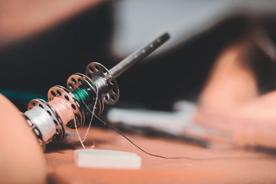 Close-up of electric lamp on table