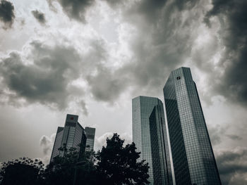 Low angle view of modern buildings against sky