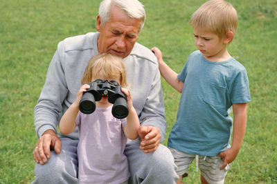 Portrait of senior couple with camera